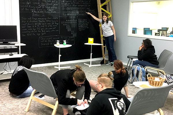 Sandy Saxon is teaching at the university quantitative reasoning center.